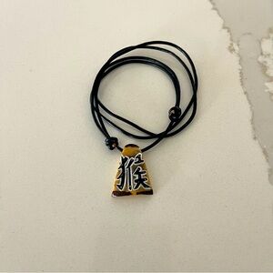 Tagua Nut pendant on slip knots adjustable Black leather Necklace